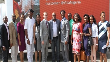 ‎A group photograph comprising team Visa and team TOTAL, immediately after announcing the partnership.‎